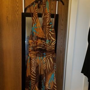 Tan silk dress with multi color accent.